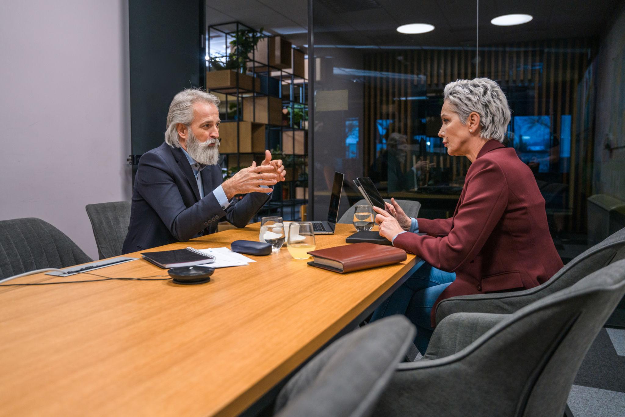 Senior business leaders in a focused strategic consultation